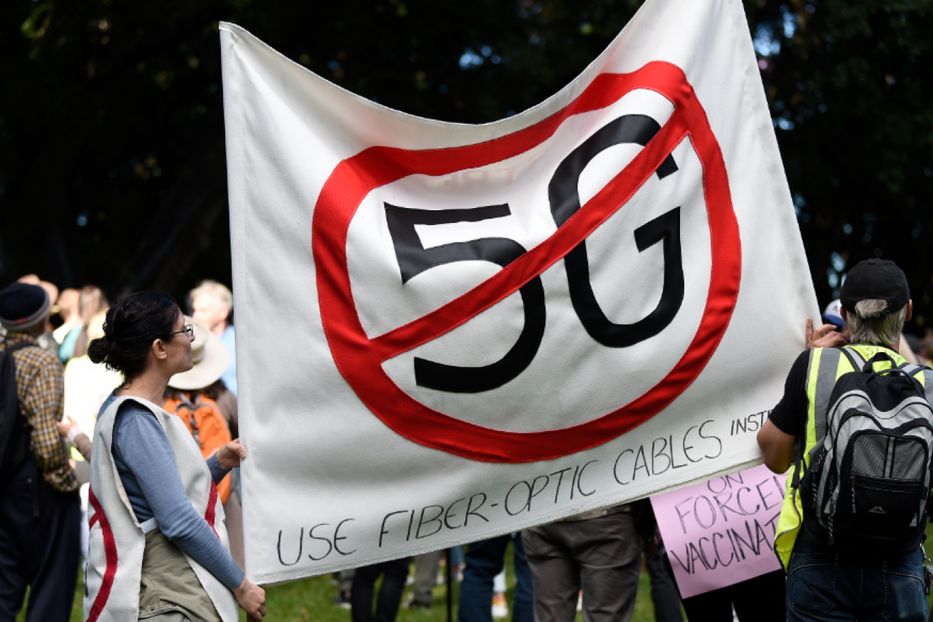 America is plagued by conspiracy theorists who believe vaccines are poison and 5G networks spread COVID-19.<i>Photo: AAP</i>