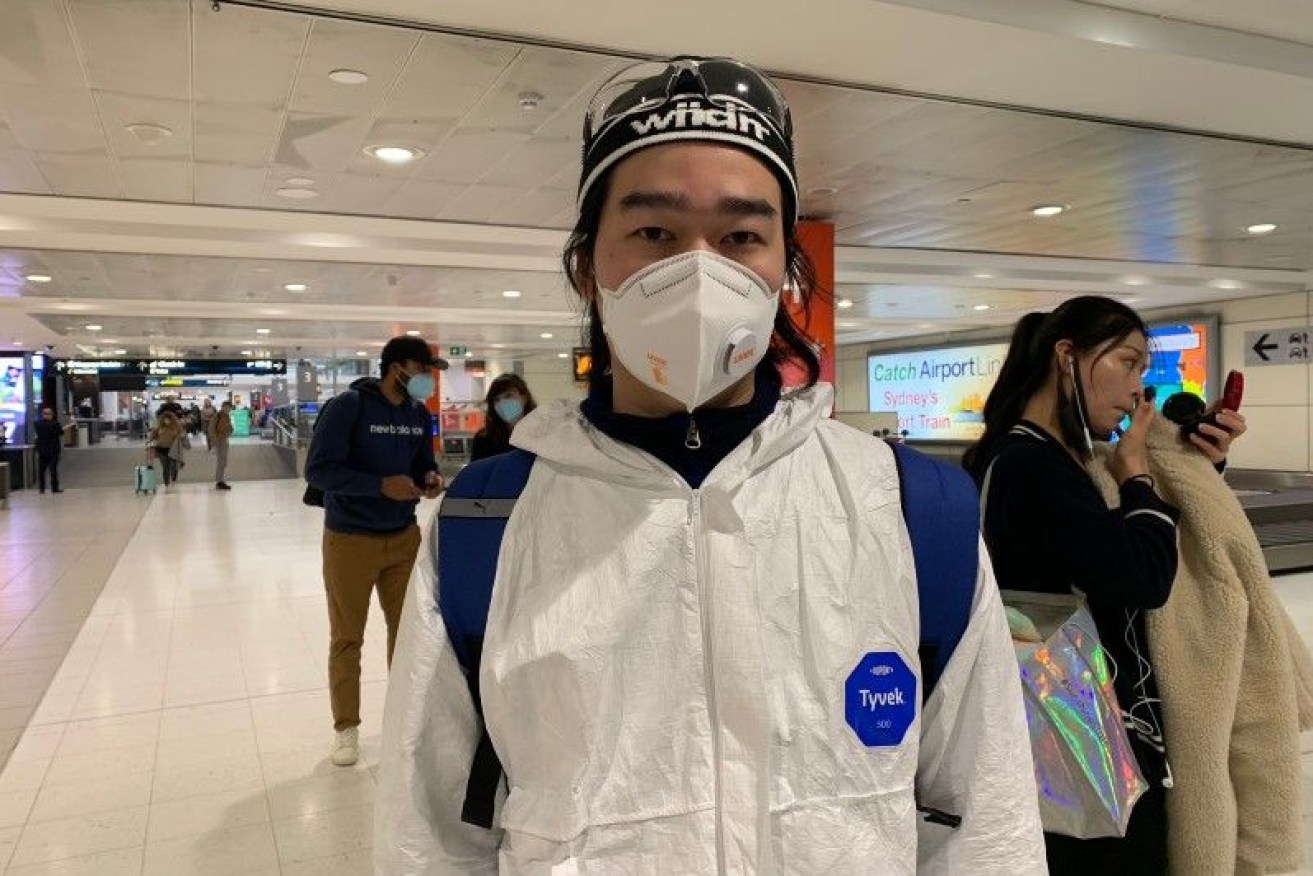 Yu Zhao Zhang travelled from Melbourne to Sydney in full PPE gear to see friends.
