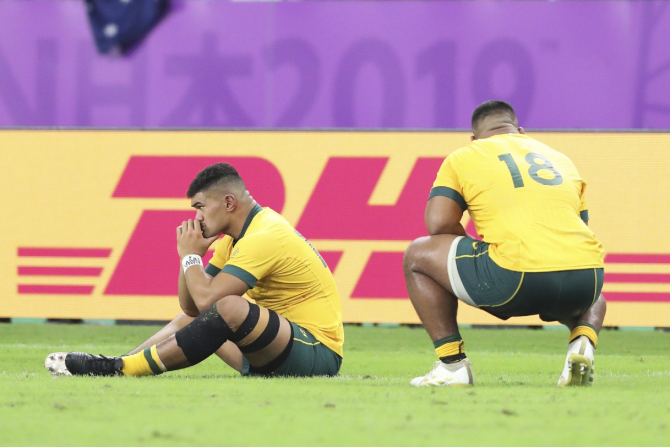 Disappointed Australian players reflect after losing in the quarter-finals of the 2019 Rugby World Cup.  