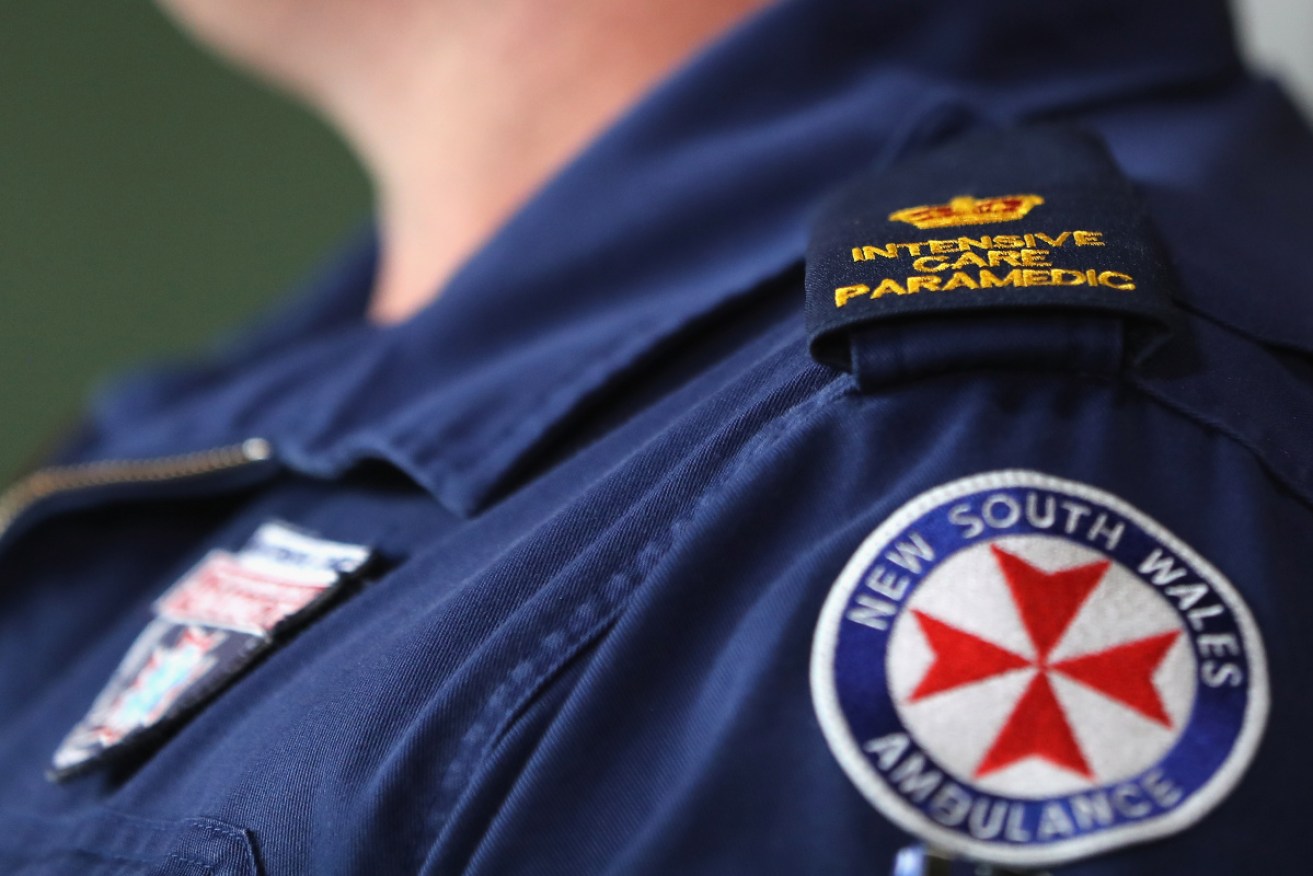 Paramedics, nurses and midwives have launched industrial action against a proposed wages freeze.