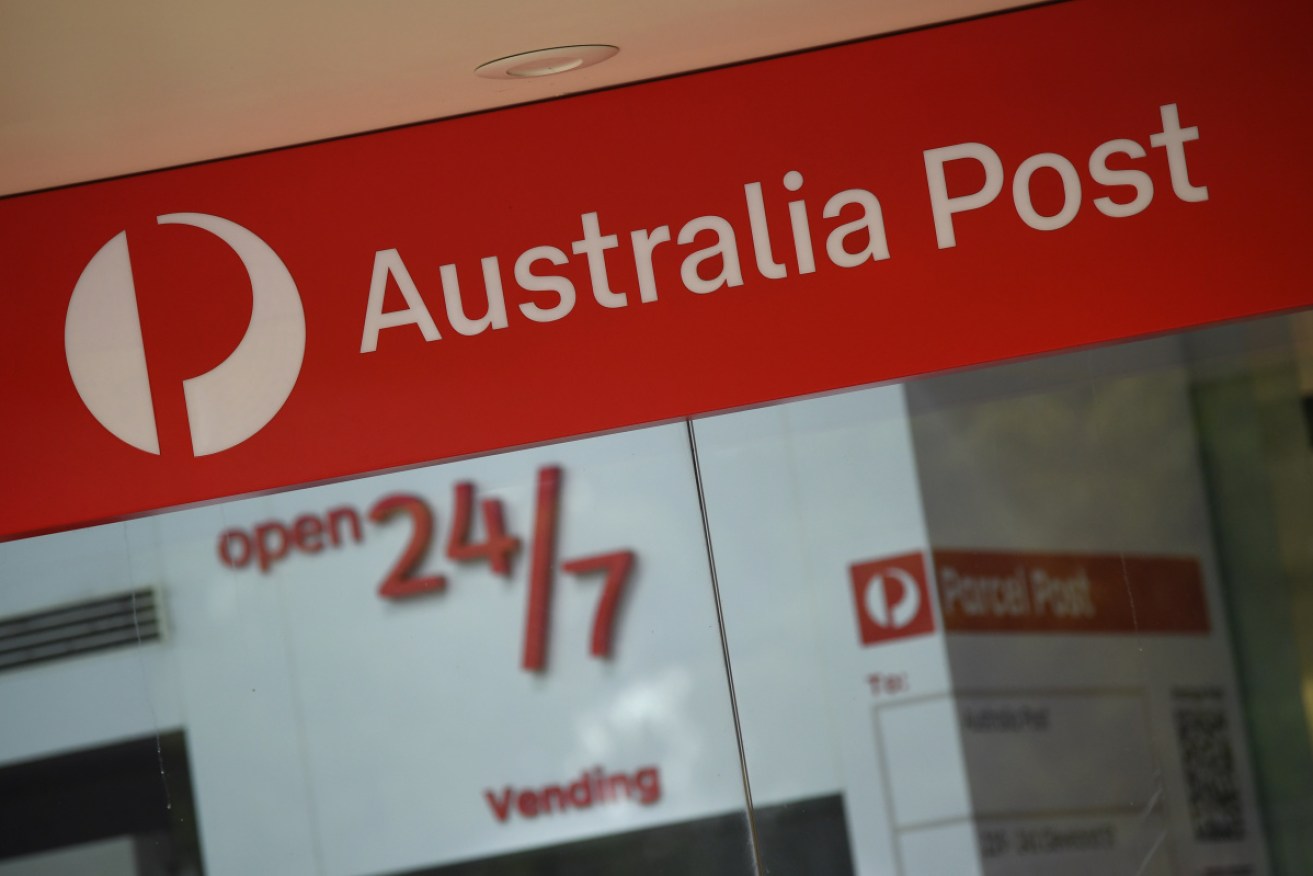 Australia Post will slash jobs at its corporate centres, but has hit back at claims that posties' jobs are at risk.