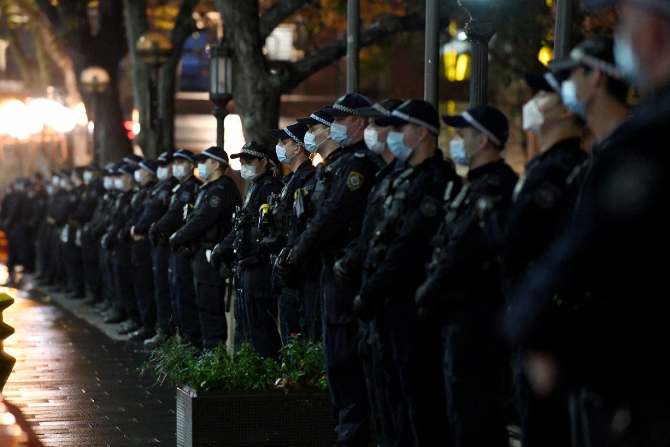 A strong presence of NSW Police at a Stop Black Deaths in Custody: Solidarity with Long Bay Prisoners vigil at Sydney Town Hall.