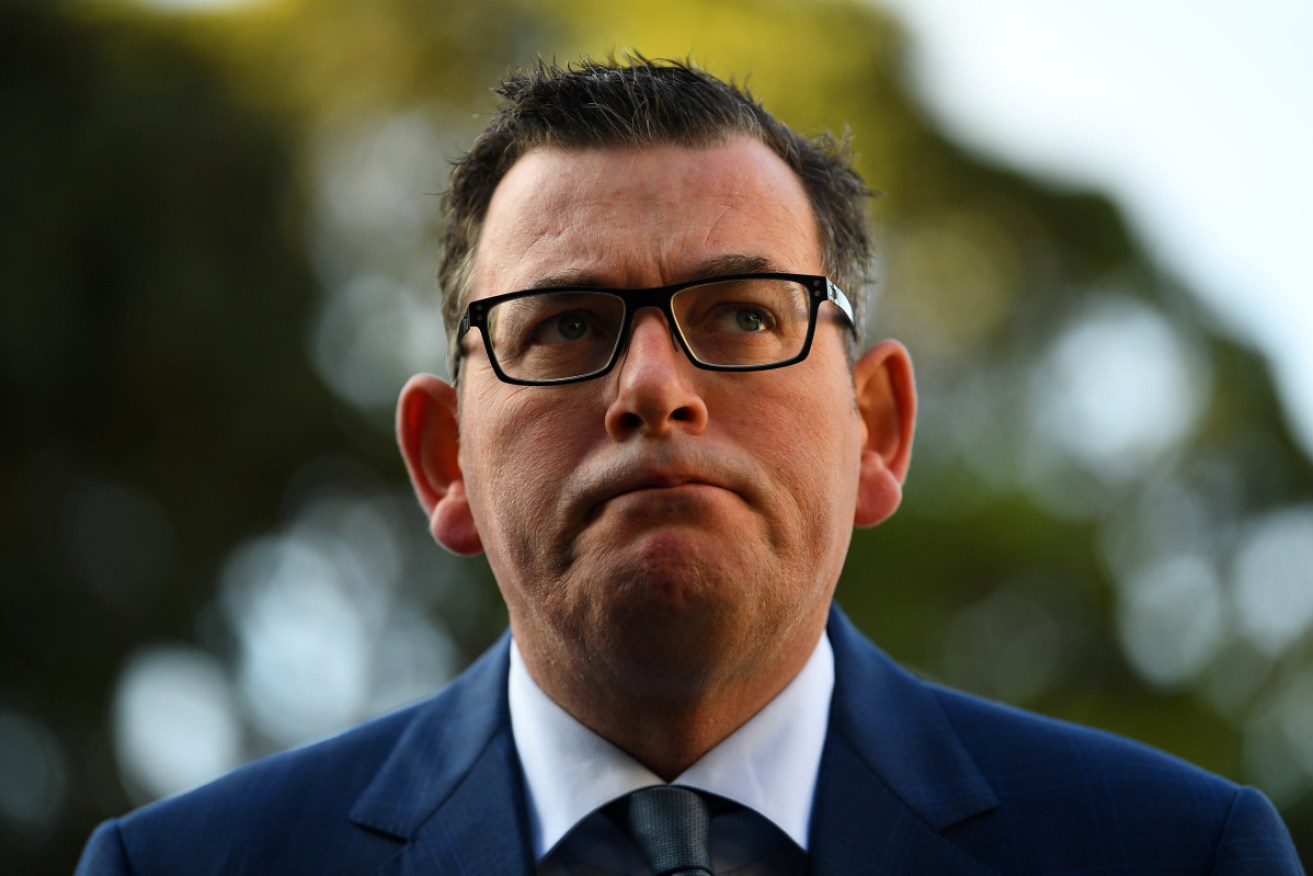 Victorian Premier Daniel Andrews front the media outside Parliament House in Melbourne on Tuesday.