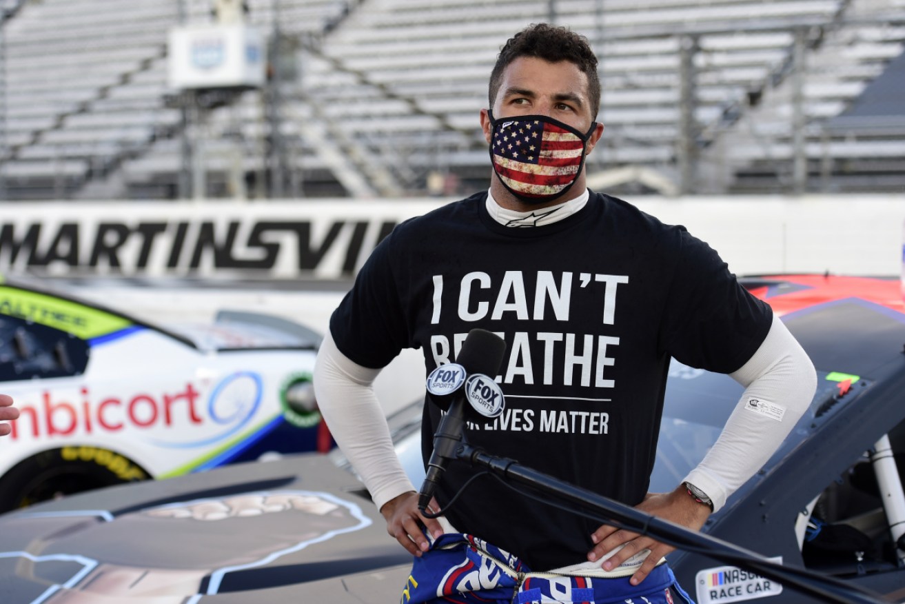 Bubba Wallace talks to the media on June 10.