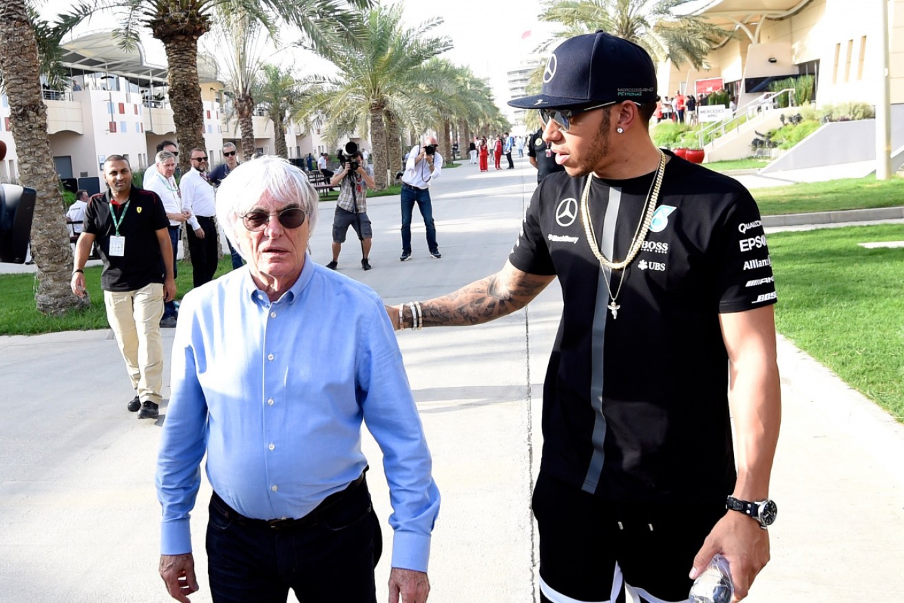 Bernie Ecclestone's comments saddened Lewis Hamilton, right.