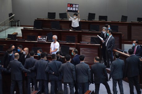Hong Kong legislature passes controversial anthem bill amid protest