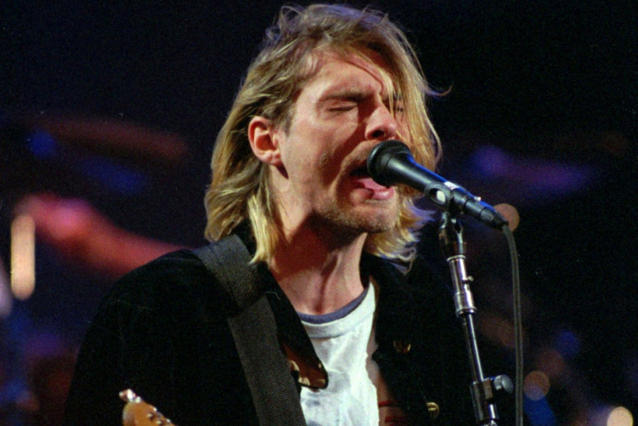 Kurt Cobain's blue Fender Mustang electric guitar used from 1993 to 1994 is up for auction.