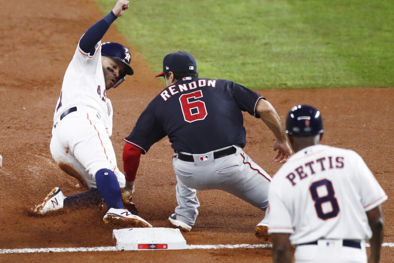 Washington Nationals’ Anthony Rendon tags Houston Astros’ Jose Altuve in the World Series game two in Houston in October.