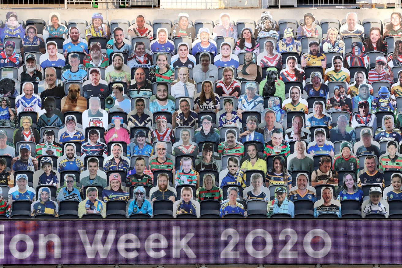 Different world: Cardboard cutouts of fans in the stands before the Round 3 NRL match between Cronulla and Wests Tigers.