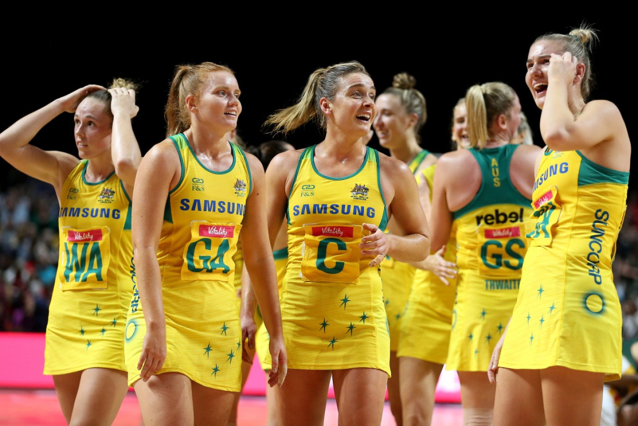 Australia's Stephanie Wood, Liz Watson and Courtney Bruce at the 2019 Netball World Cup in Manchester. 