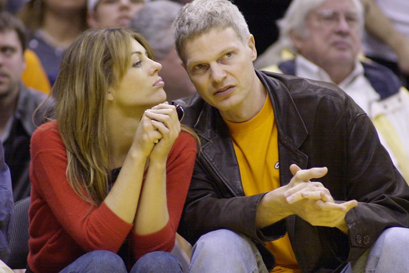 Elizabeth Hurley and Steve Bing take in an Los Angeles Lakers basketball game in Los Angeles in February 2011. 