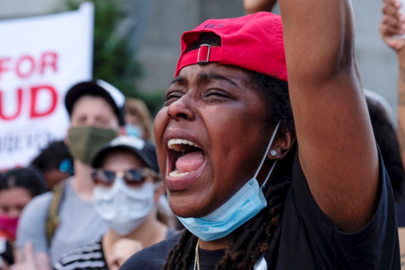 A protester adds her voice to the roar of fury in Atlanta after the latest police shooting of a black man.