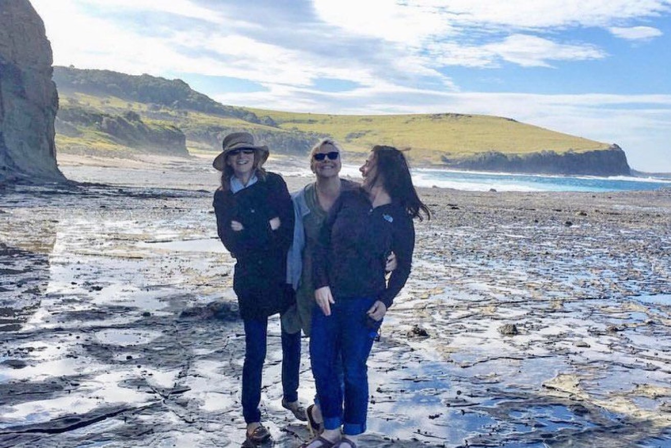 Kate Mather (centre) runs a business that was affected by both the bushfires and the pandemic.