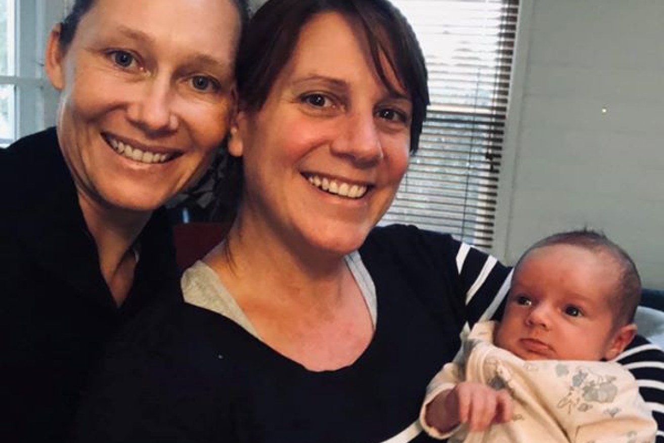Sam Stosur with partne Liz Astling who gave birth to the couple's first child, daughter Evie.