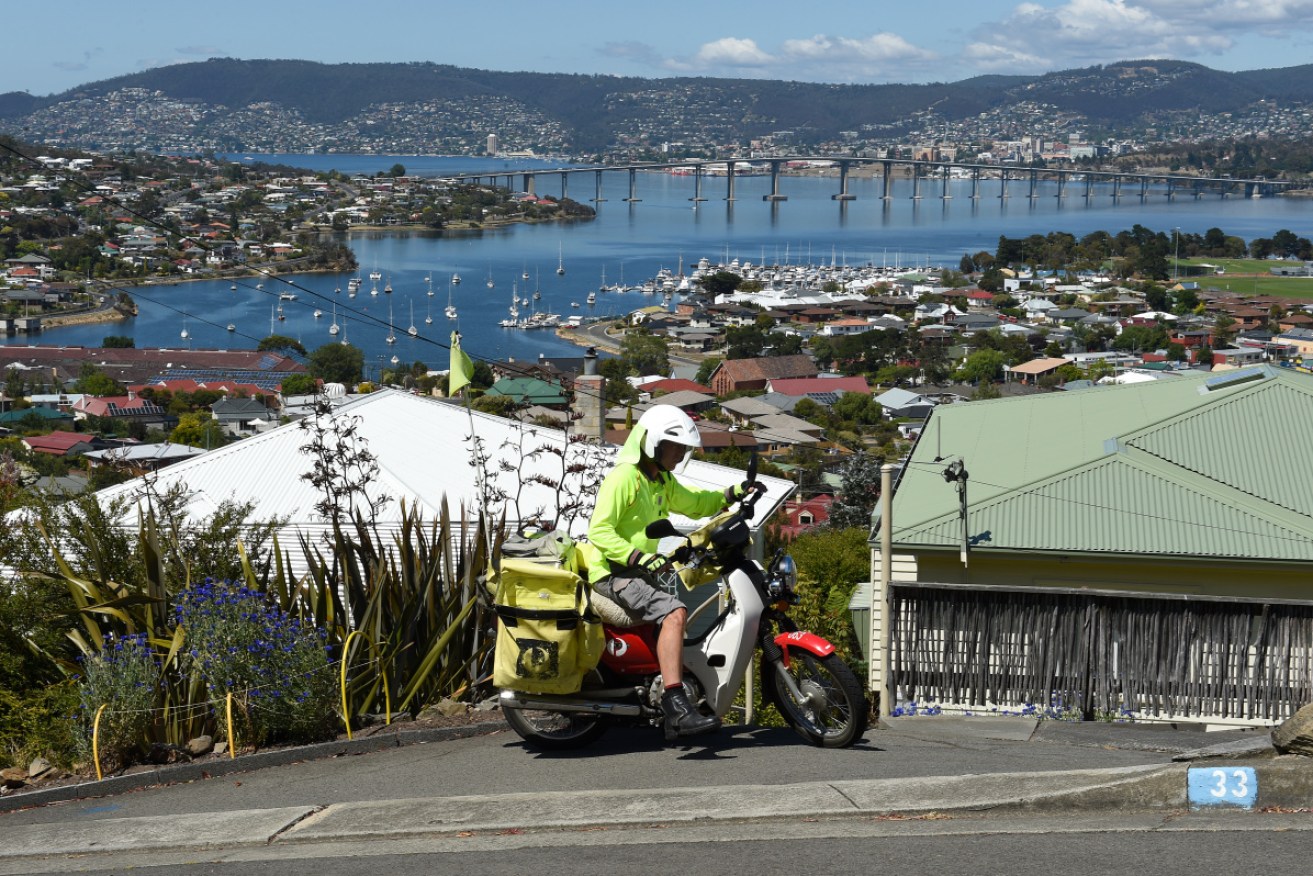 We'll see fewer of these deliveries and more parcels under a deal struck between the posties' union and Australia Post.