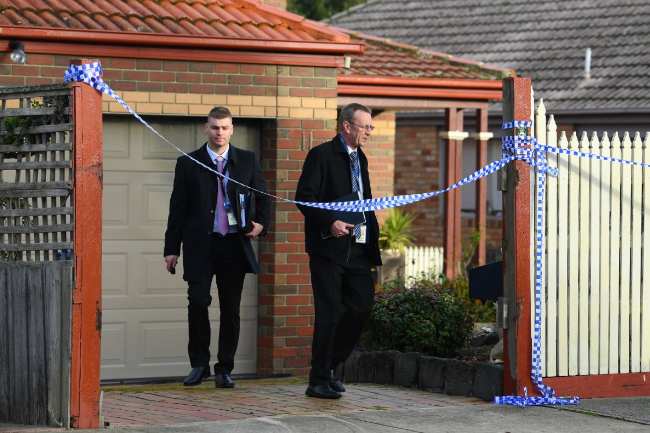 A man has been arrested after the death of a woman in Melbourne's northern suburbs overnight.