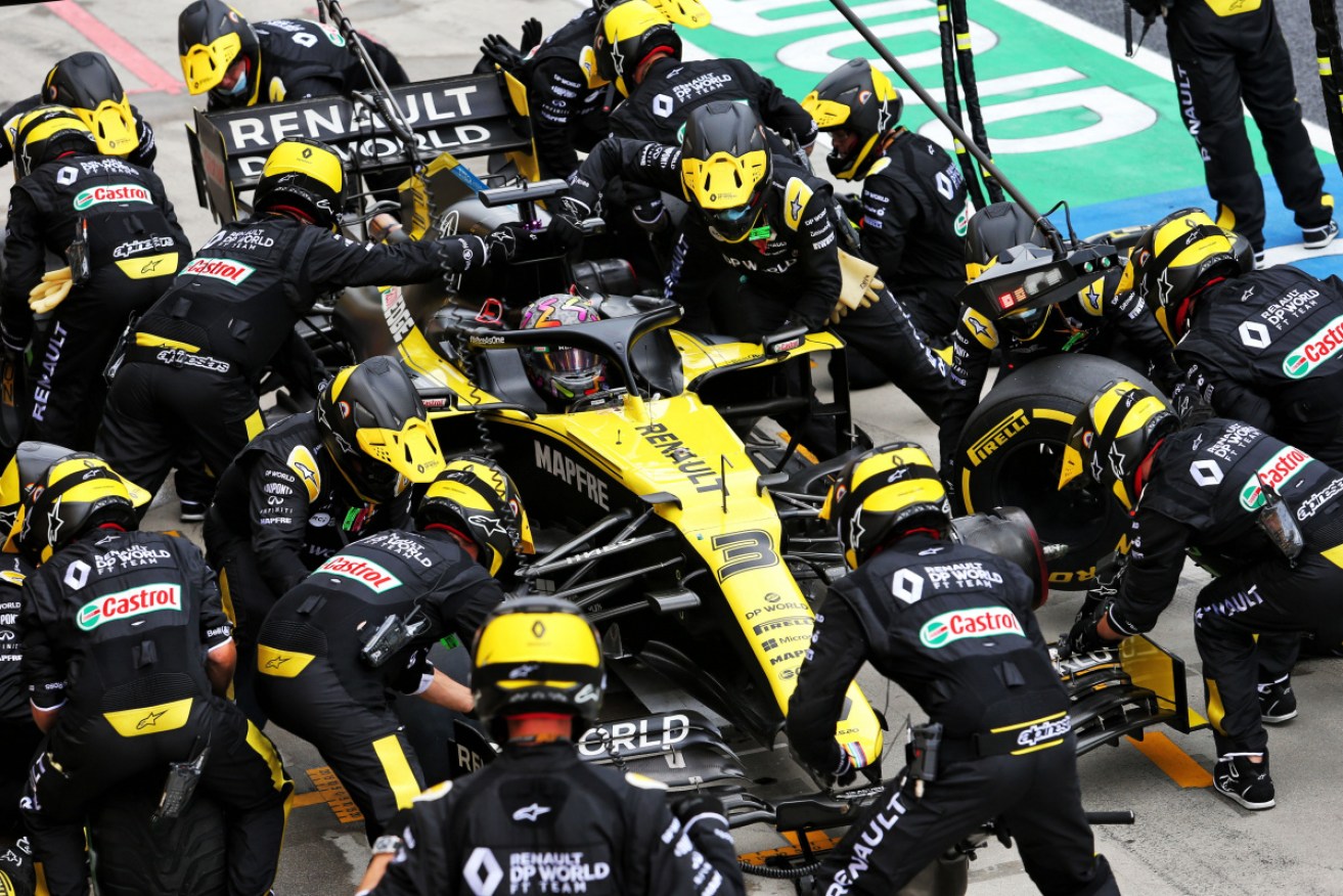 Daniel Ricciardo's team during one of the crucial pitstops at Budapest.
