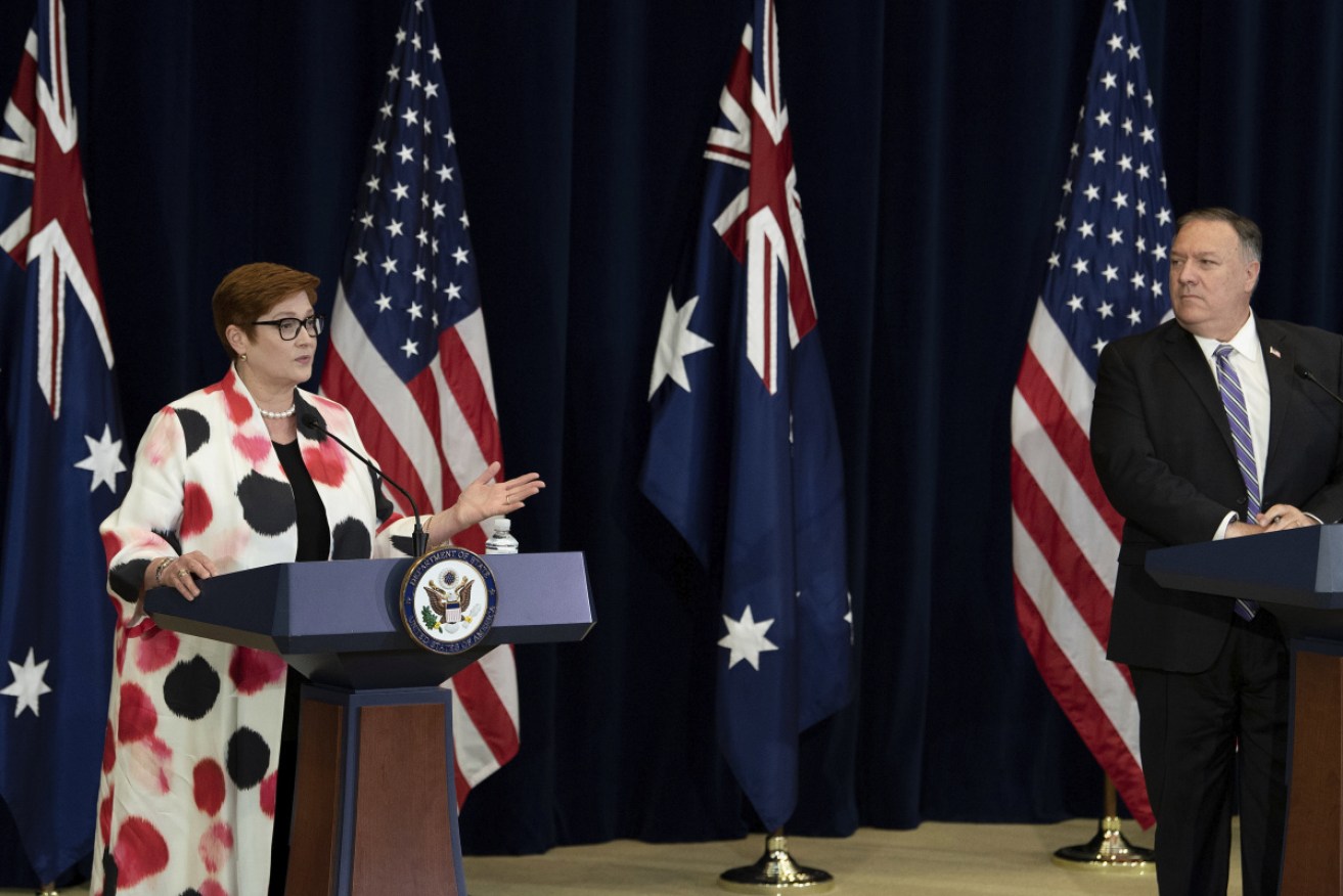 US Secretary of State Mike Pompeo listens while Foreign Minister Marise Payne speaks  at the US State Department. 