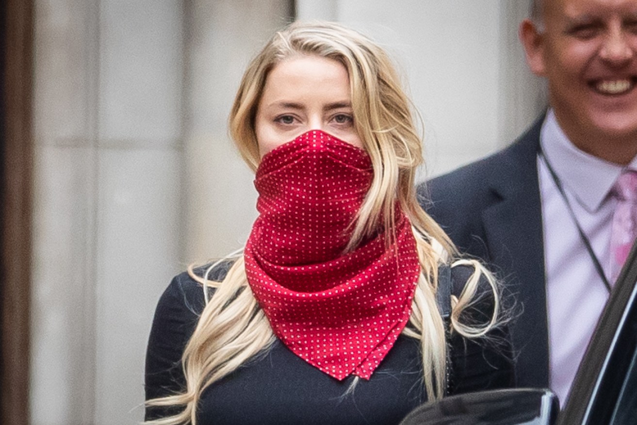 Actress Amber Heard leaves the High Court in London following a hearing on July 7.