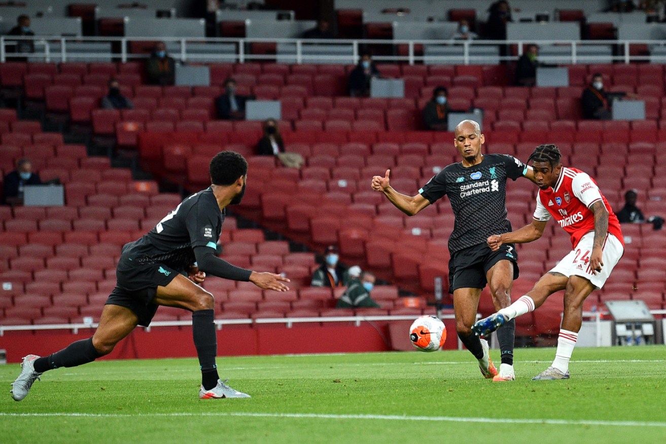 Reiss Nelson scores Arsenal's second goal  against Liverpool.