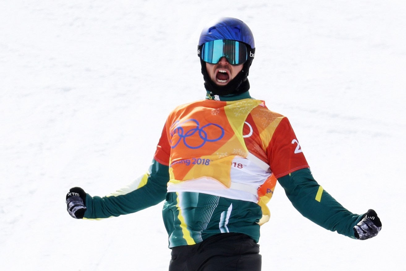 Chumpy Pullin celebrates a semifinal win at the 2018 Winter Olympics.