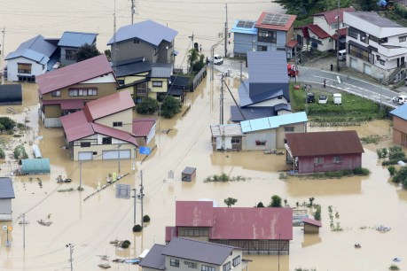 Thousands told to evacuate as record rain causes mass floods in Japan