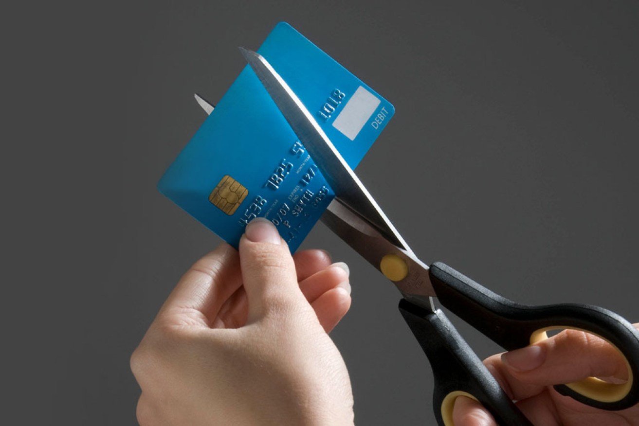 Australians wiped $1.64 billion off credit card debt accruing interest in May, the largest-ever monthly fall.