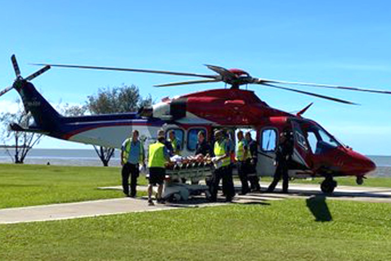 Queensland Ambulance Service and rescue paramedics treated the woman at the scene.