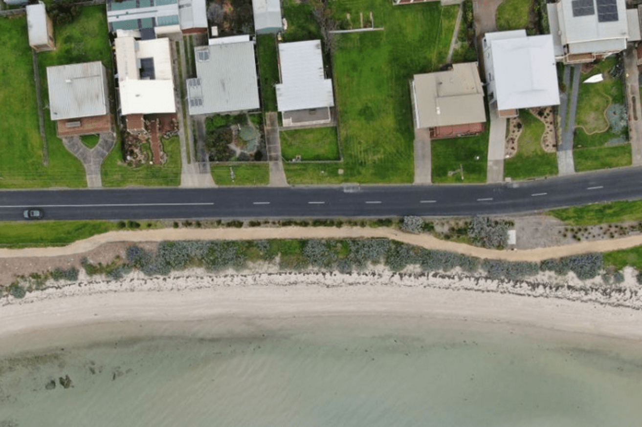 The relentless sea creeps ever closer to the vulnerable community of Indented Head