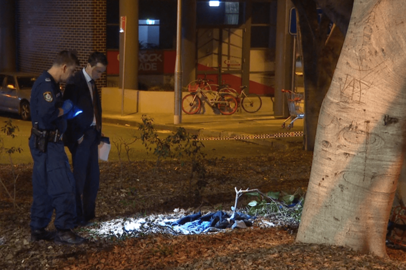 Police gather evidence in Pyrmont on Friday night.