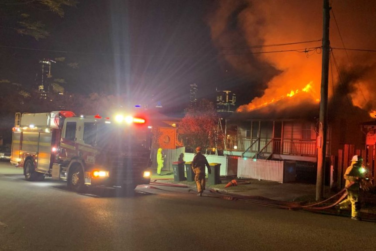 Two houses and cars were damaged in the suspicious fires at Highgate Hill.