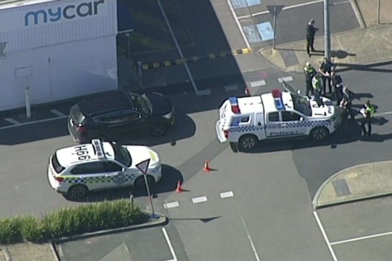 Two people sustained injuries after reports of a man with a weapon at the shopping centre.