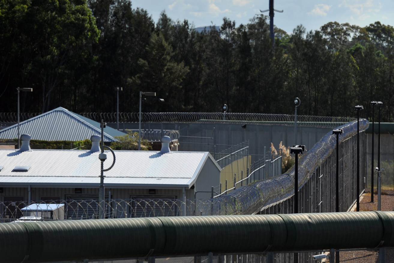 A female prison guard will undergo surgery after being stabbed in the back at Sydney's Silverwater jail.