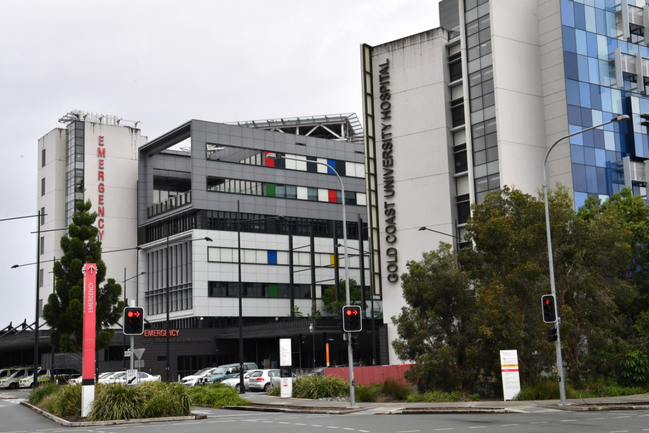 Police say there was a "minor disturbance" at the Gold Coast University hospital, where the man is being treated.