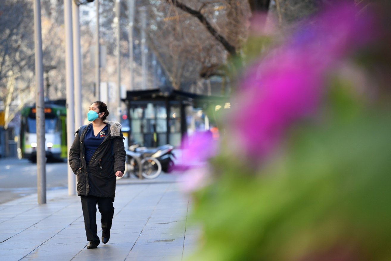 Premier Daniel Andrews says some virus restrictions will remain in Victoria for many months.