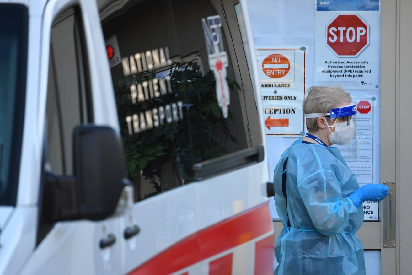 A healthcare worker at the Glenlyn Aged Care Facility in Melbourne's west, one of three taken over by the state government this week.