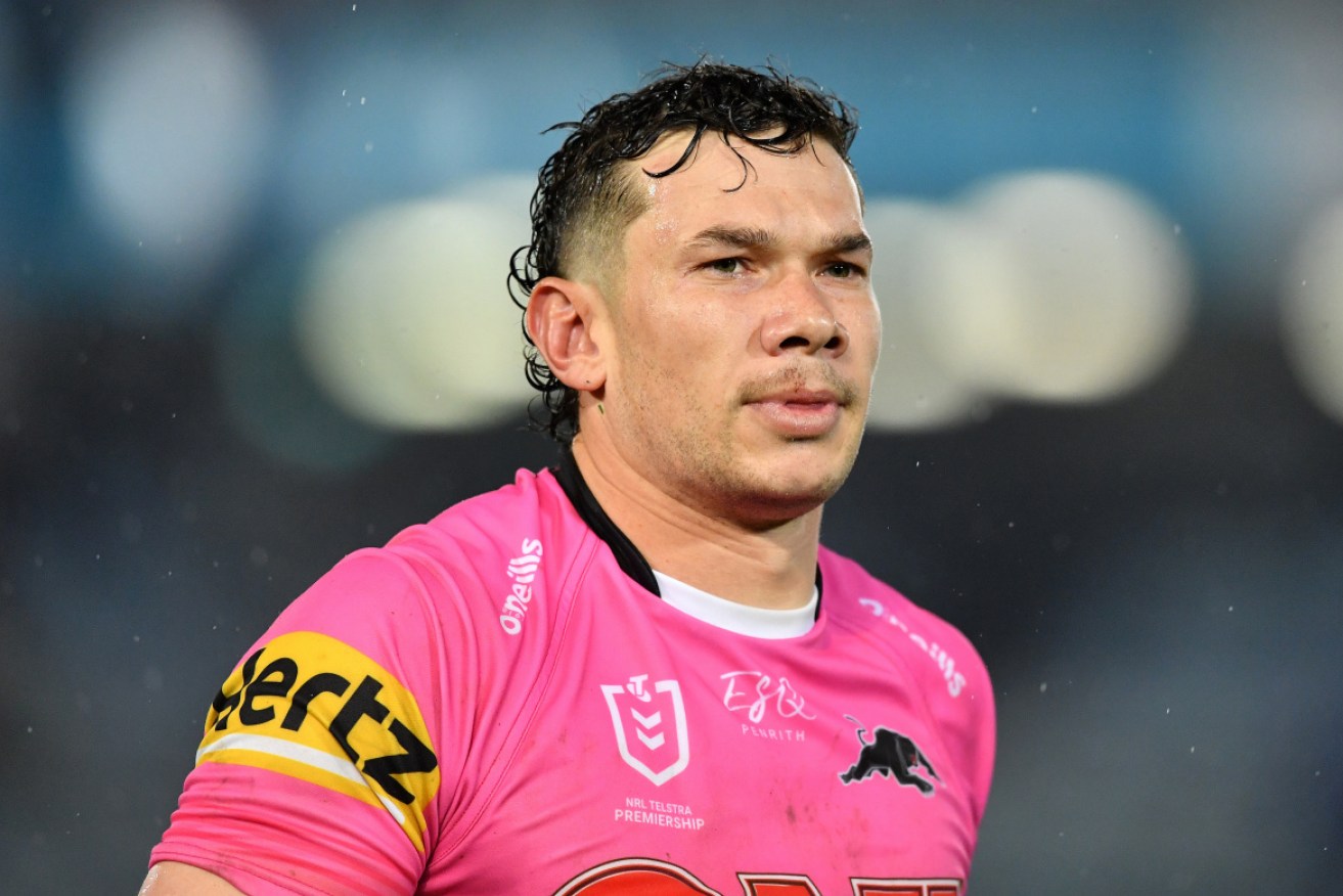 A group of people have been ejected from Friday's NRL match in Gosford for allegedly racially abusing Penrith winger Brent Naden.