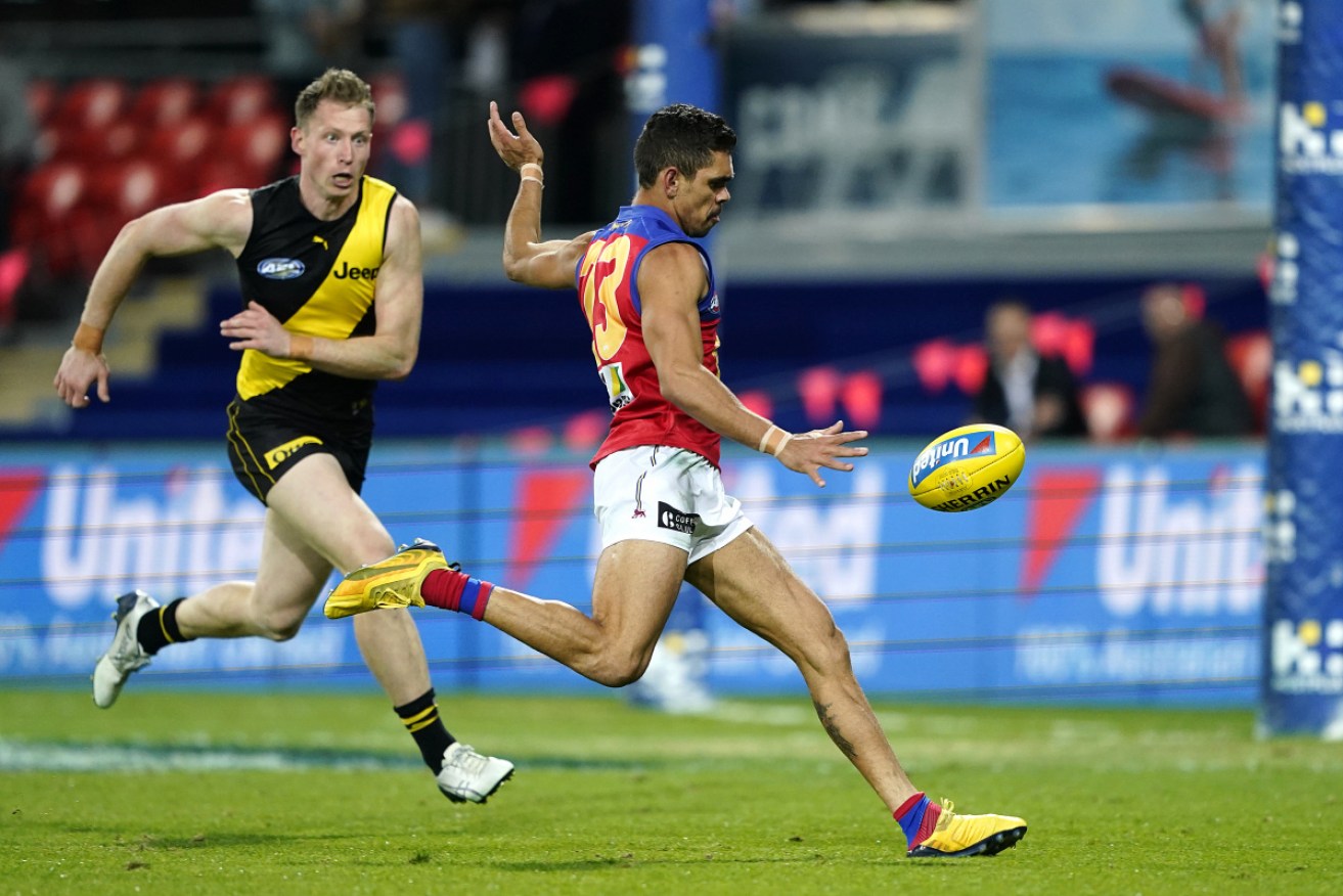 Richmond's Dylan Grimes, left, suffered ‘extreme threats’ during online abuse.
