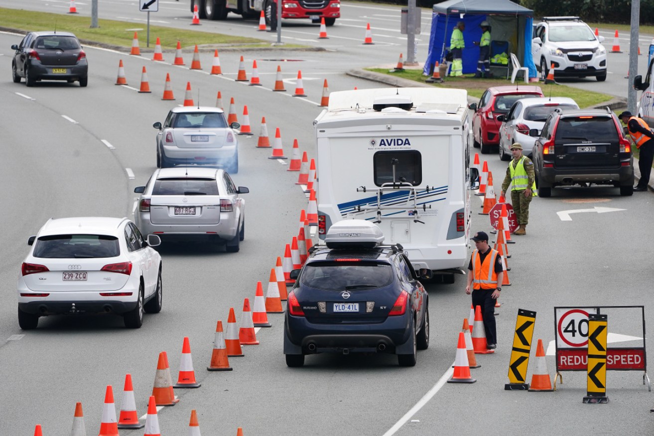 Queensland wants to see the final analysis of suppression measures before reopening its borders.