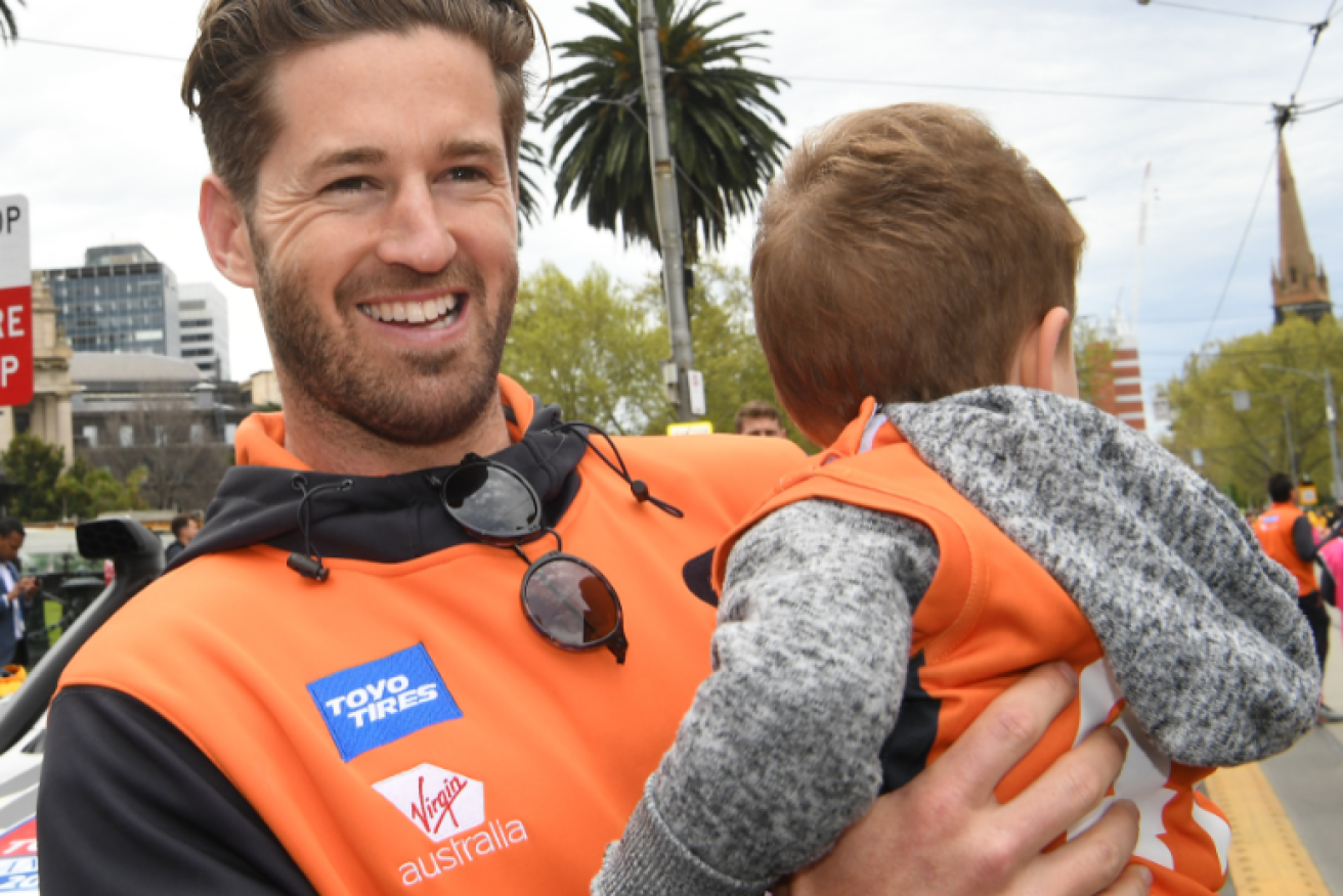 GWS star Callan Ward has also been abused online, along with his young son, Romeo.