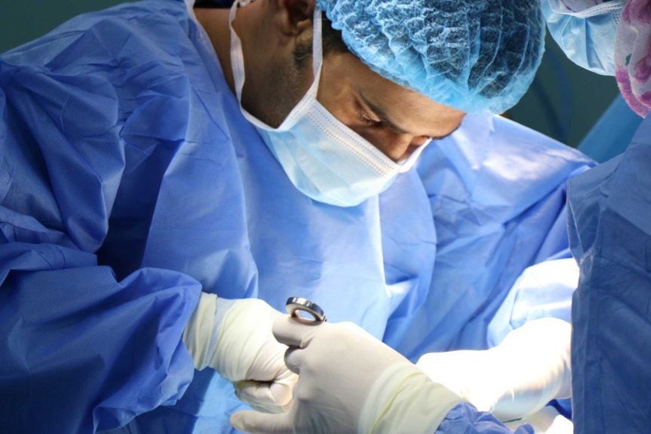 Surgeons are calling for operations to continue through the Christmas break.