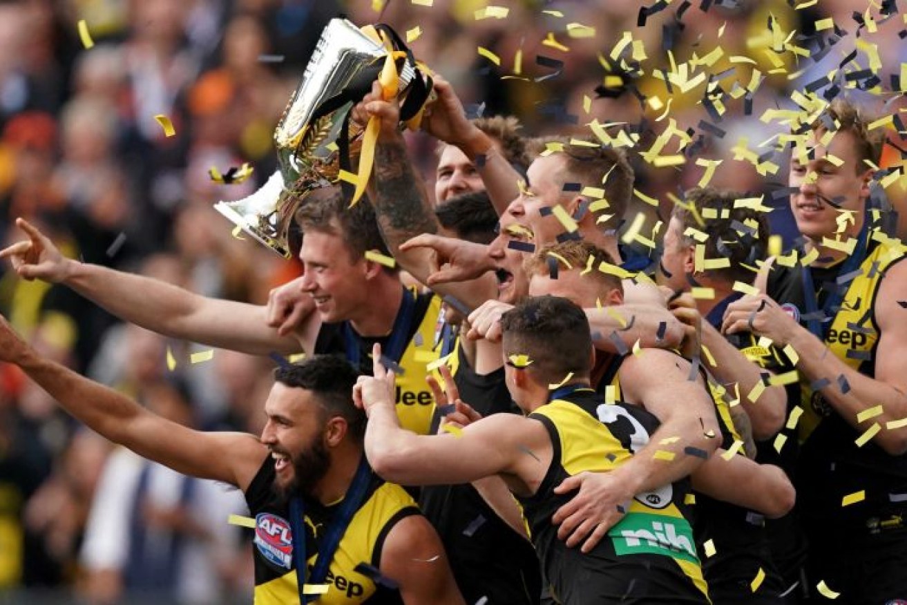 The AFL trophy was flown from Victoria to Queensland on Tuesday.