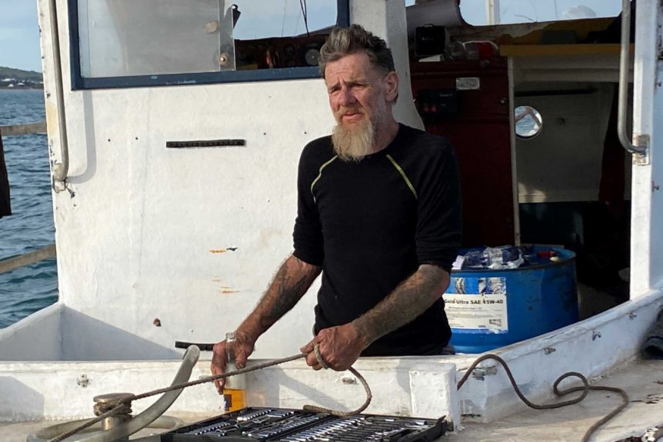 Tony Higgins on board his boat Margrel after his first rescue