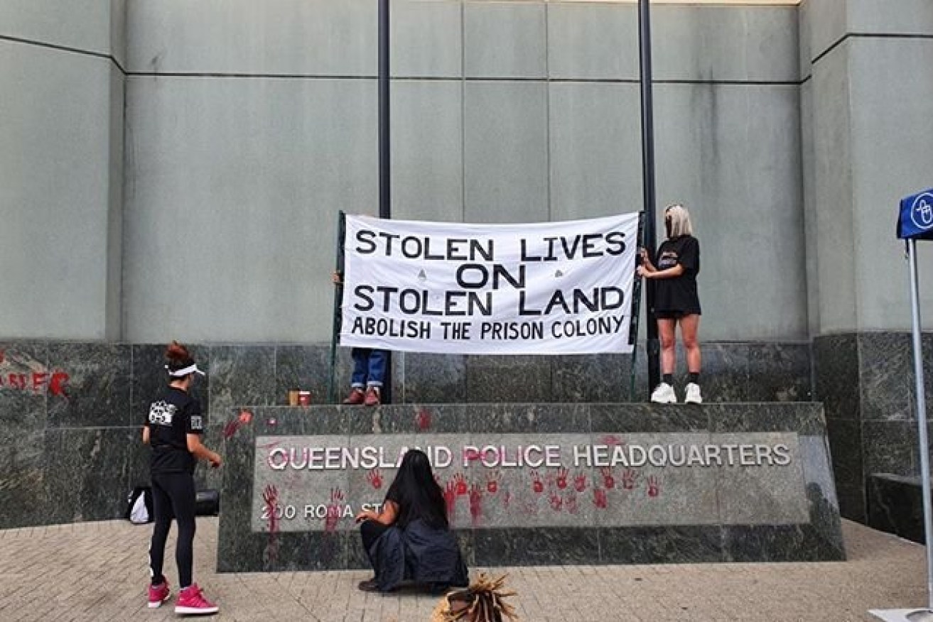 Protesters gathered outside police headquarters in Brisbane demanding answers over the death of an Indigenous woman. Photo: ABC/Rory McGahan