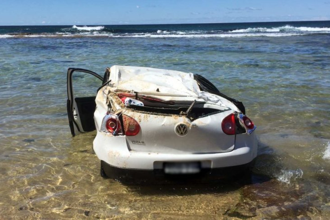 The woman driver, a baby and a woman on the beach were injured in the incident.