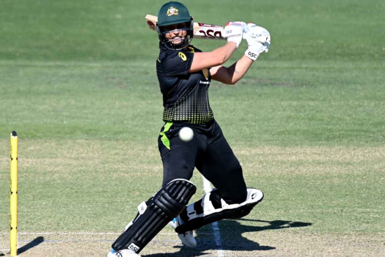 Ashleigh Gardner sends another one towards the boundary in her master lass 61-run innings.