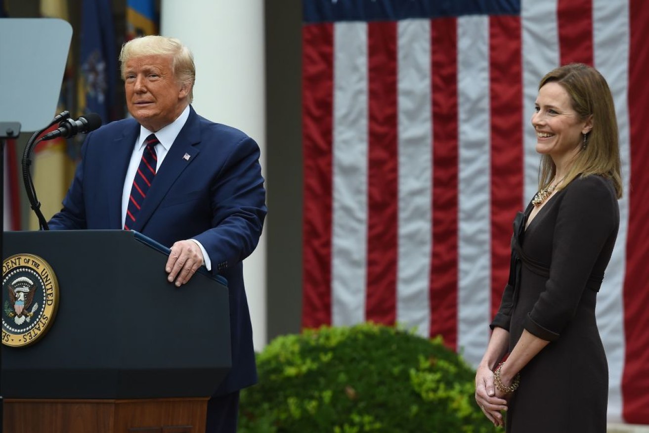 Donald Trump push to seat Judge Barrett on the Supreme Court is under a COVID cloud.<i>Photo: AAP</i>