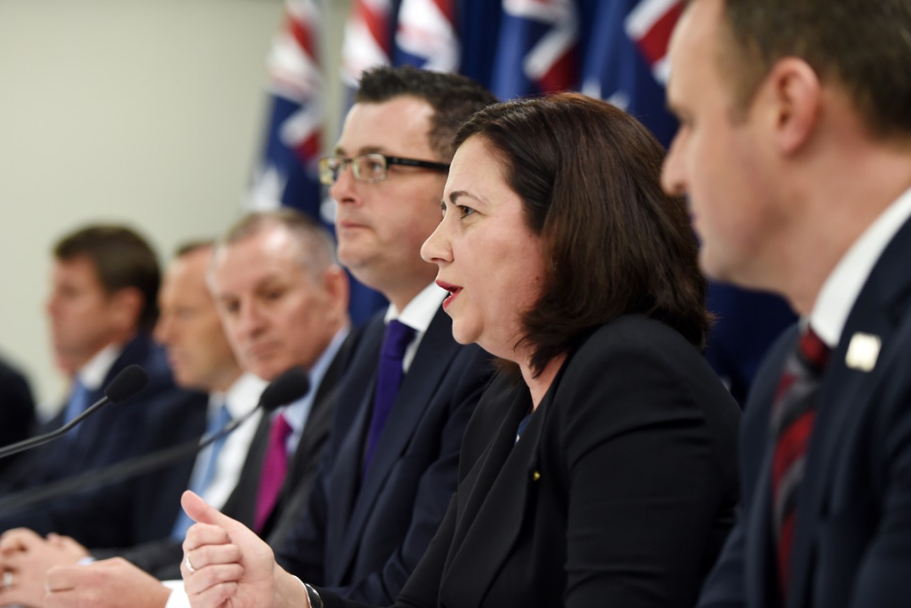 Queensland Premier Annastacia Palaszczuk with Victorian Premier Daniel Andrews (centre) at a 2015 COAG meeting.