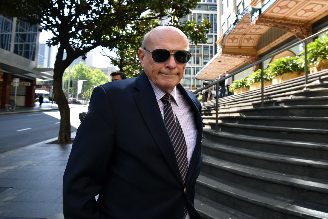 Ross McCarty leaves court in Sydney after an earlier hearing.