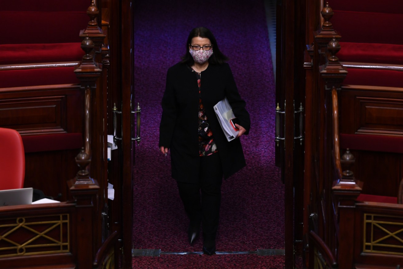 Victorian Health Minister Jenny Mikakos arrives at question time in Victoria's parliament. 